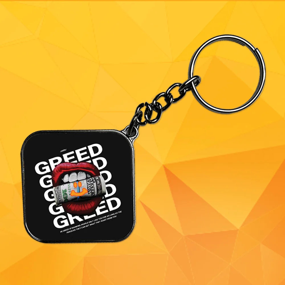 Greed - Keychain With Silver Border (Pack Of 2)