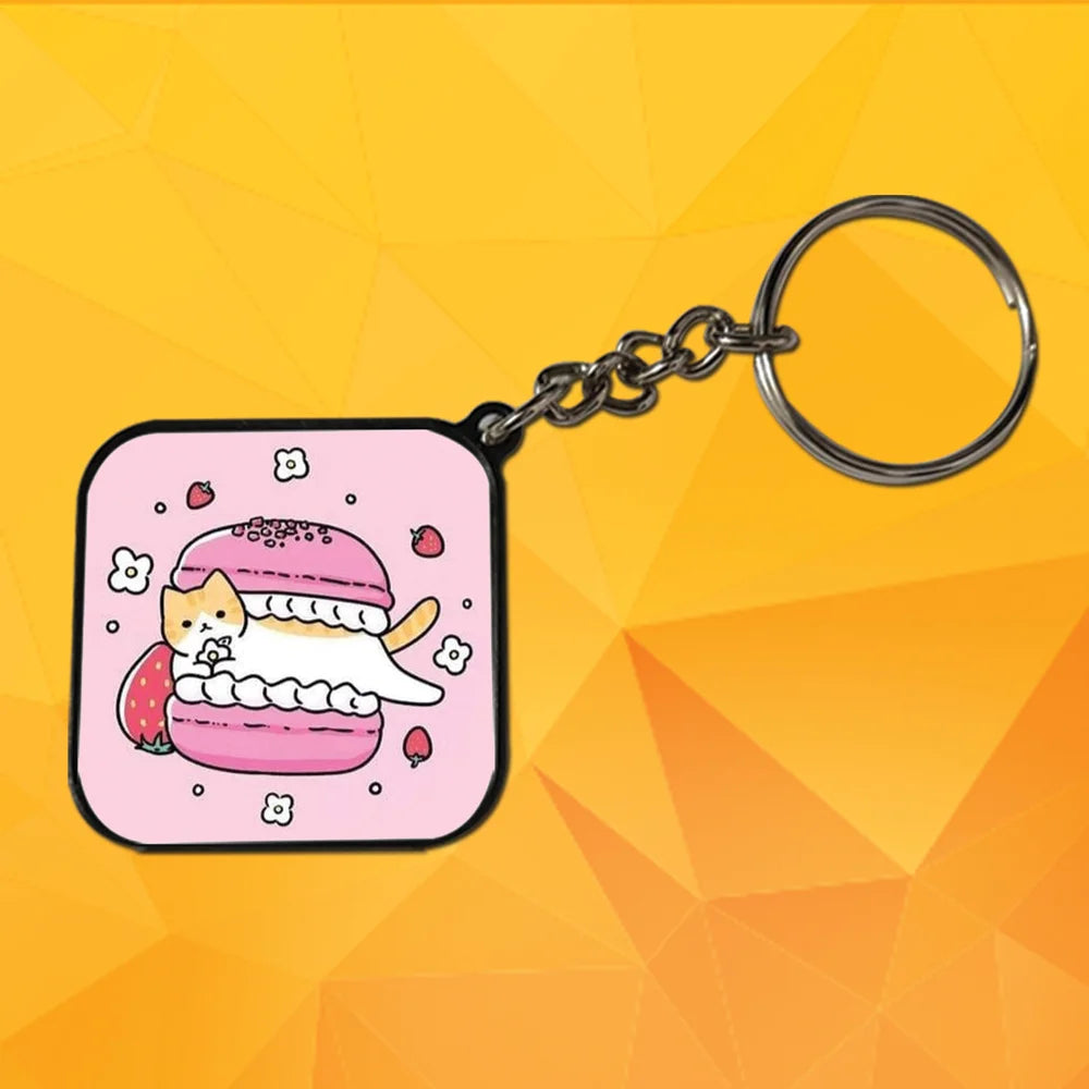 Cute Cat With Macroon - Keychain With Black Border (Pack Of 2)