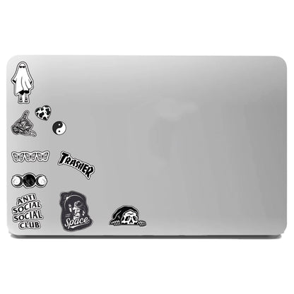 Grunge Themed Stickers On Laptop