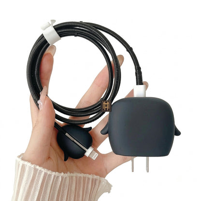 Penguin charger protector set shown with the charging cable and cable tie