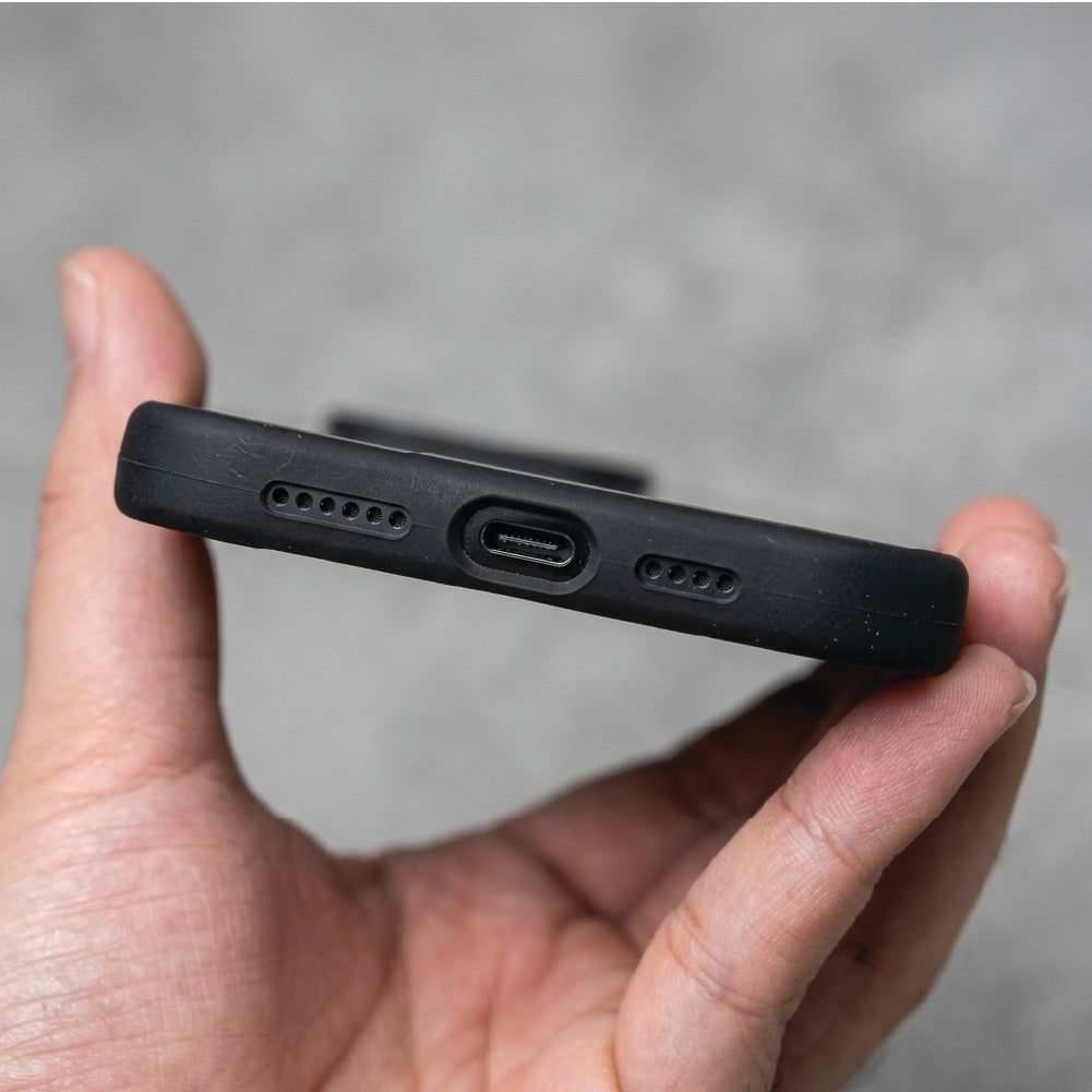 iPhone 17 black Ferrari case bottom view – precise USB-C port, speaker and mic cutouts