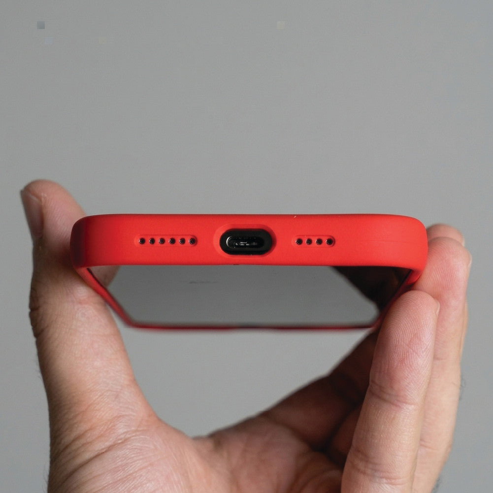 iPhone 17 red Ferrari case bottom view – raised edge protects the screen, precise USB-C cutout