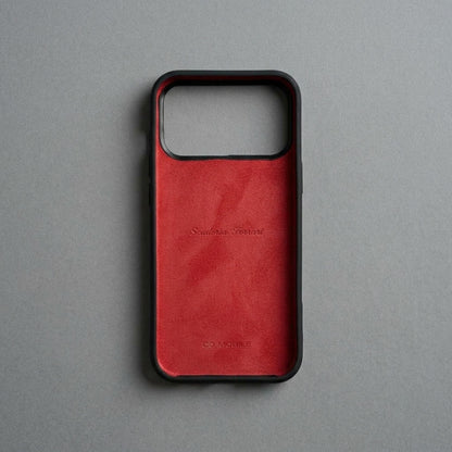 Inside of black Ferrari case for iPhone 18 Pro – soft red microfiber lining protects the phone