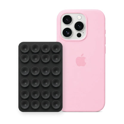 iPhone 16 Pro Liquid Silicone case in Baby Pink with a Black suction phone holder