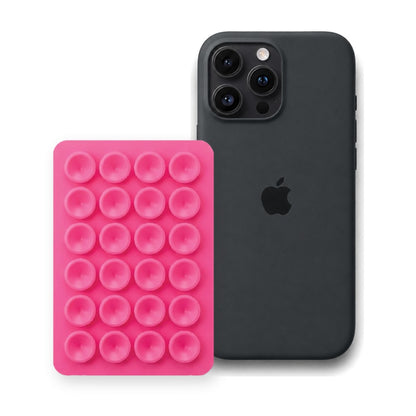 iPhone 16 Pro Liquid Silicone case in Black with a Hot Pink suction phone holder