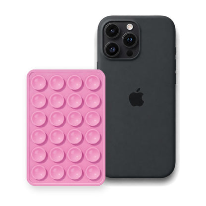 iPhone 16 Pro Liquid Silicone case in Black with a Light Pink suction phone holder