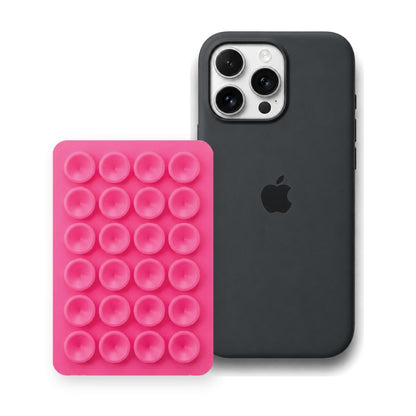 iPhone 16 Pro Max Liquid Silicone case in Black with a Hot Pink suction phone holder