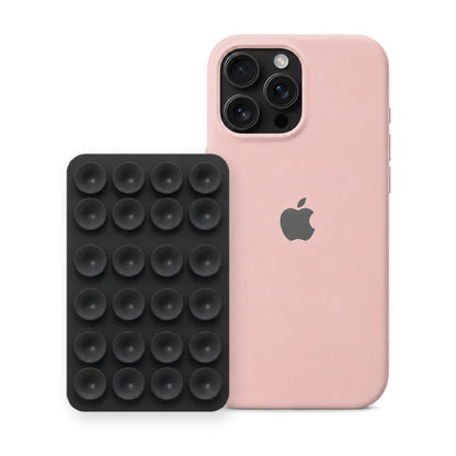 iPhone 16 Pro Max Liquid Silicone case in Sand Pink with a Black suction phone holder