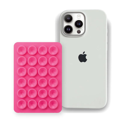 iPhone 16 Pro Max Liquid Silicone case in White with a Hot Pink suction phone holder