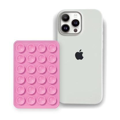 iPhone 16 Pro Max Liquid Silicone case in White with a Light Pink suction phone holder