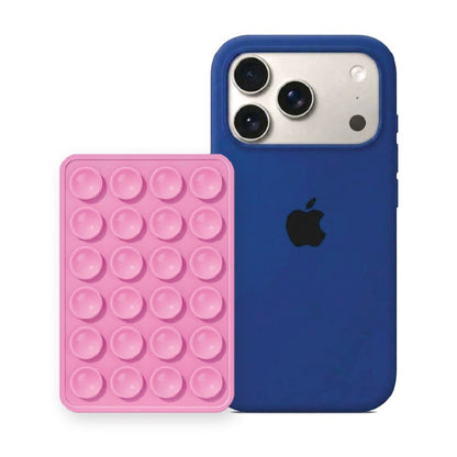 iPhone 17 Pro Liquid Silicone case in Royal Blue with a Light Pink suction phone holder