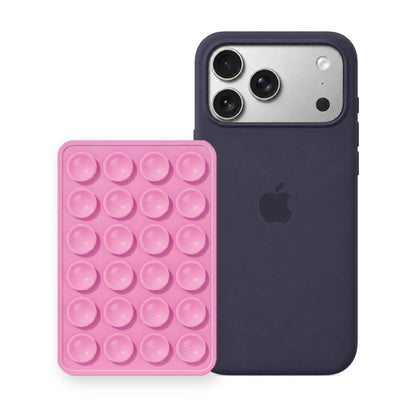iPhone 17 Pro Max Liquid Silicone case in Storm Blue with a Light Pink suction phone holder