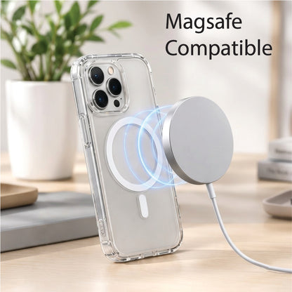 Magnetic wireless charger snapping onto iPhone with clear MagSafe case