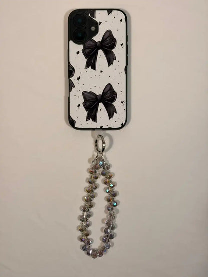 Silver crystal phone charm on a phone