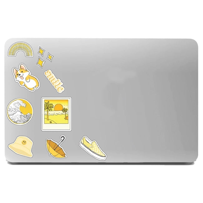 Yellow Themed Stickers On Laptop